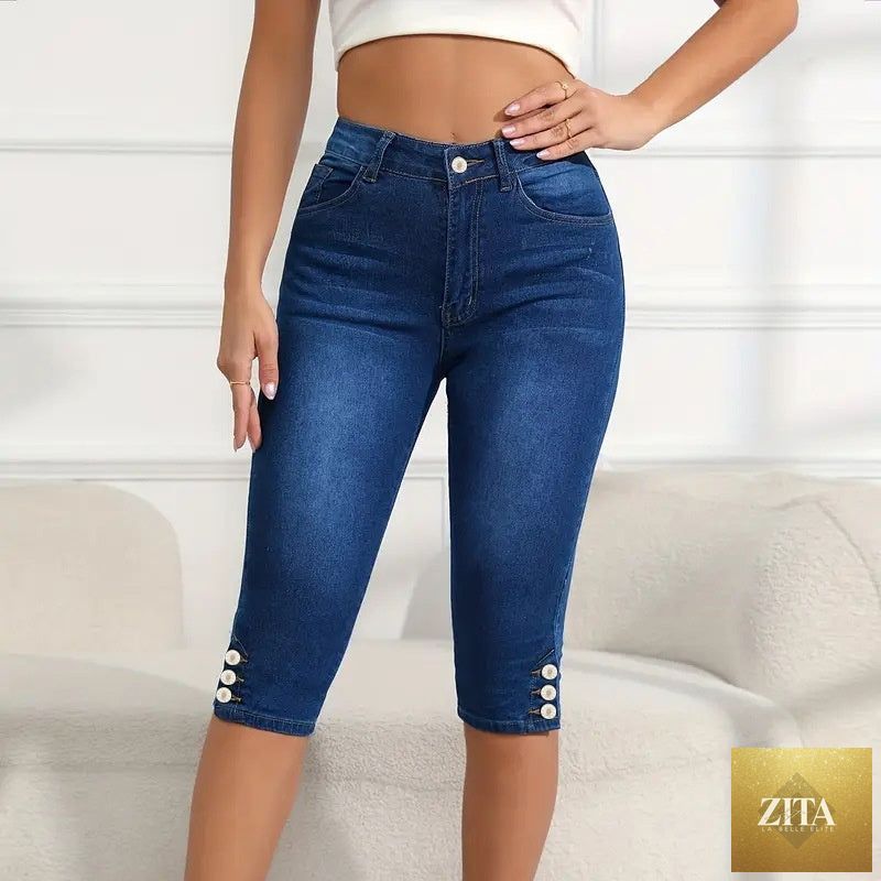 Plus-size women's slim-fit Capri pants from My Store, featuring a versatile design and comfortable fit, shown in a natural pose.