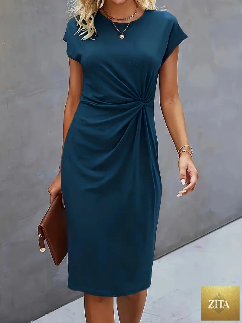 FitiqueFit front knot bodycon midi dress with sleeveless design and round neck, featuring a stylish tie detail.