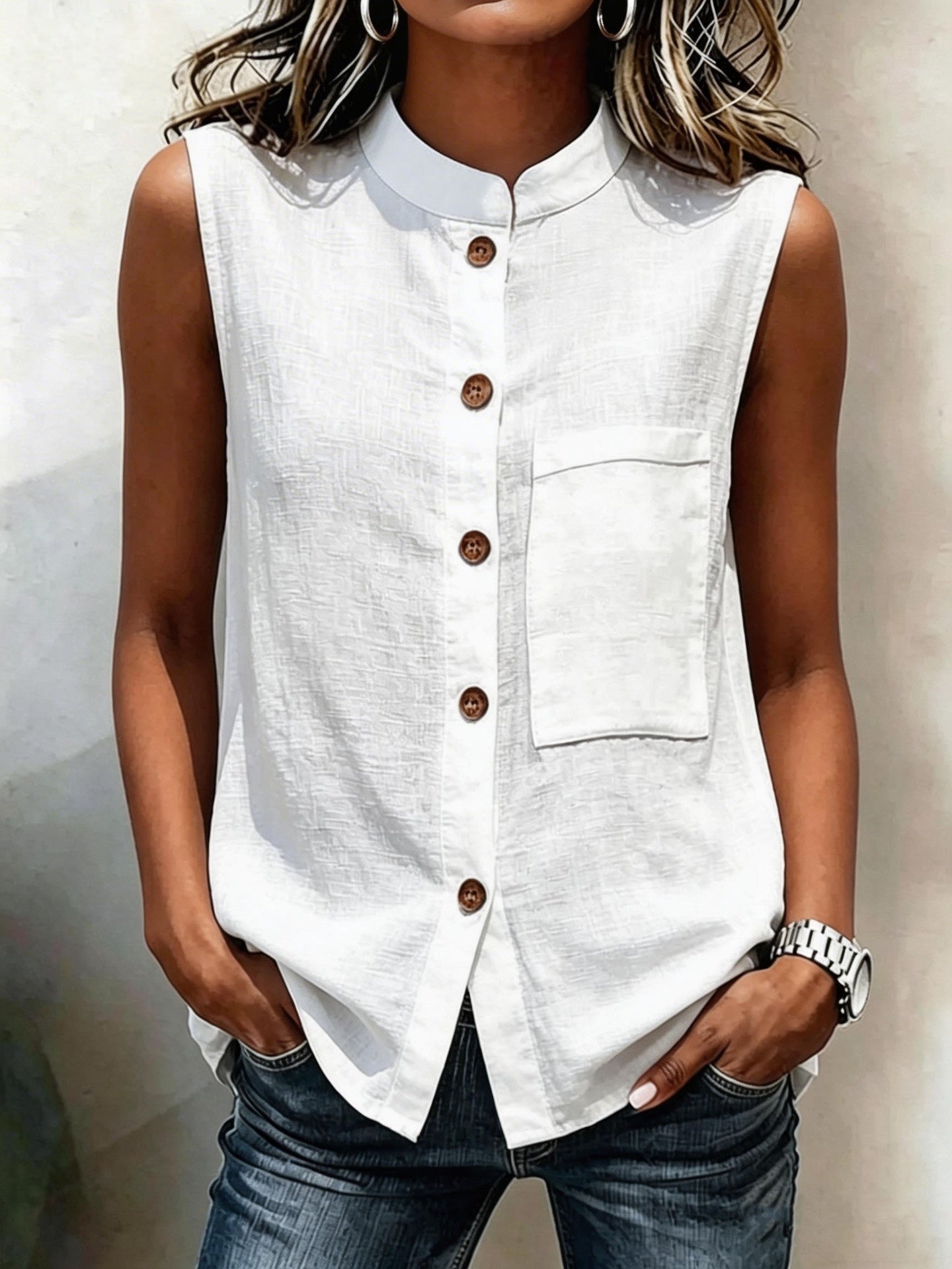 Women's sleeveless crop top with buttoned pockets in solid color, casualwear by FitiqueFit, shown on a model.