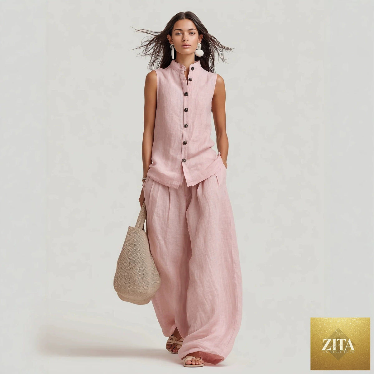 Women's sleeveless top and high-waist wide-leg pants casualwear set by Zita La Belle Elite, featuring a stand collar and stylish fit.