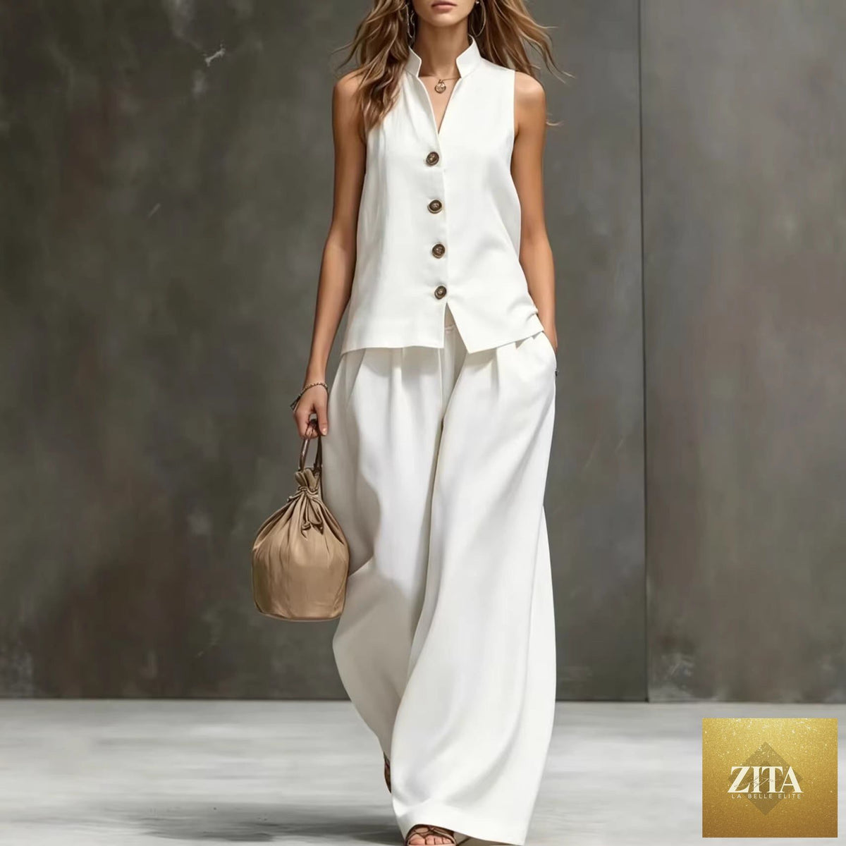 Women's sleeveless vest and wide-leg pants two-piece set in cotton linen by Zita La Belle Elite, featuring a relaxed, stylish look.