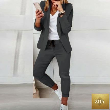 FitiqueFit lapel blazer and drawstring trousers two-piece OL suit in multiple colors, featuring a professional and stylish design.