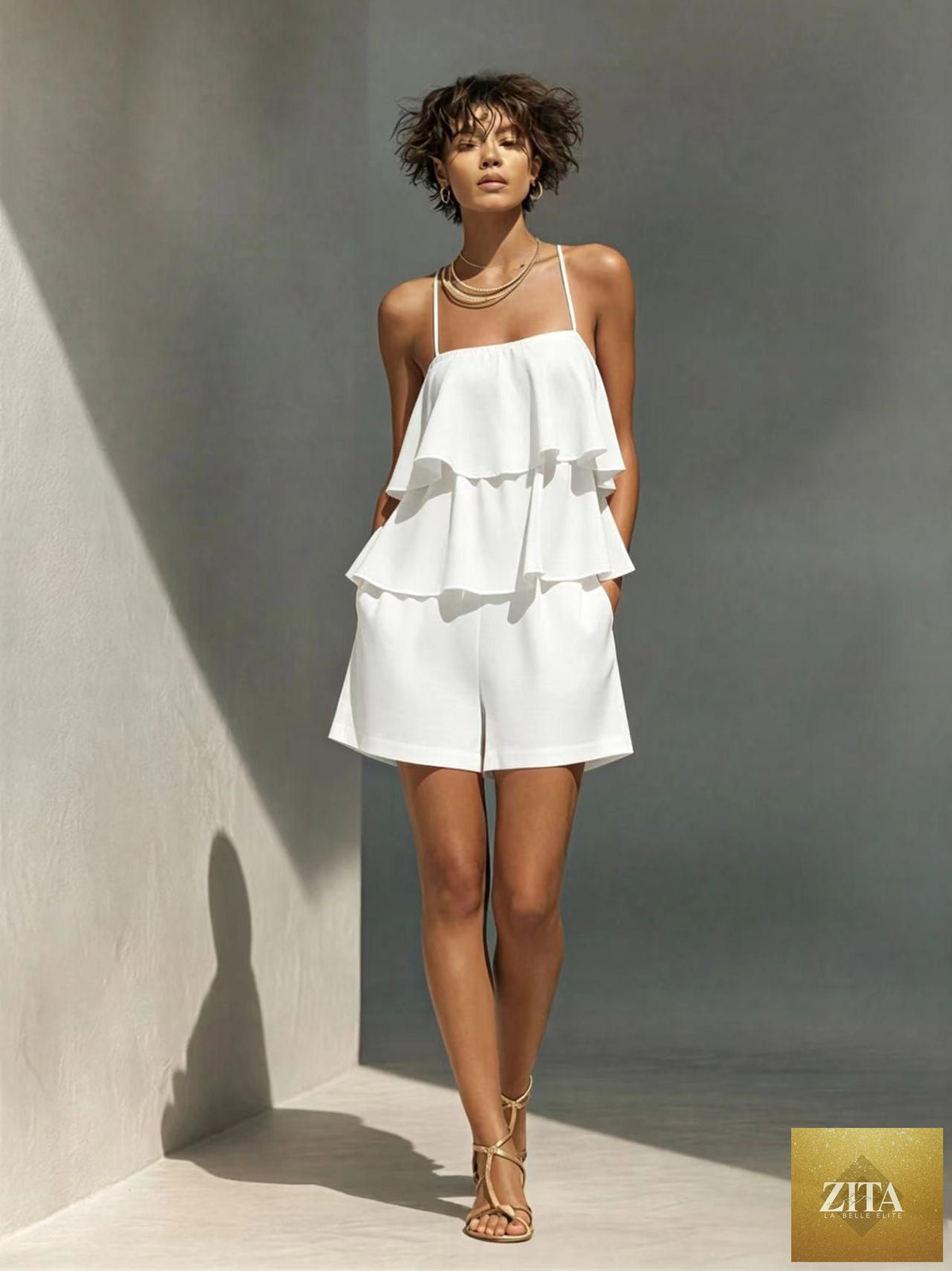 Women's multi-layer ruffle camisole and shorts set by Zita La Belle Elite, featuring casualwear with feminine ruffle details.