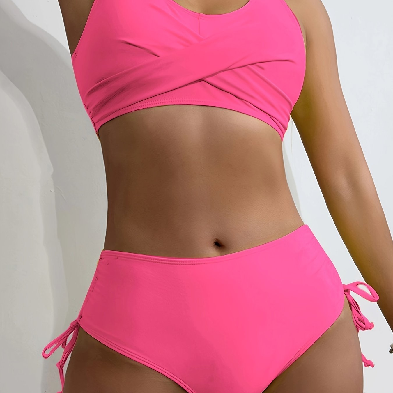 Stevvex women's bikini set with twist front V-neck, high waist, and tie-back design in solid color, perfect for beach and pool days.