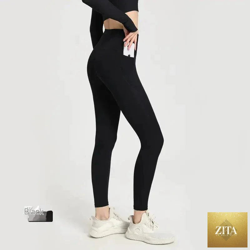 Women’s MANDOTOS Dual-Comfort Athletic Pants with stretchy fabric, ergonomic design, and sporty style for active wear.