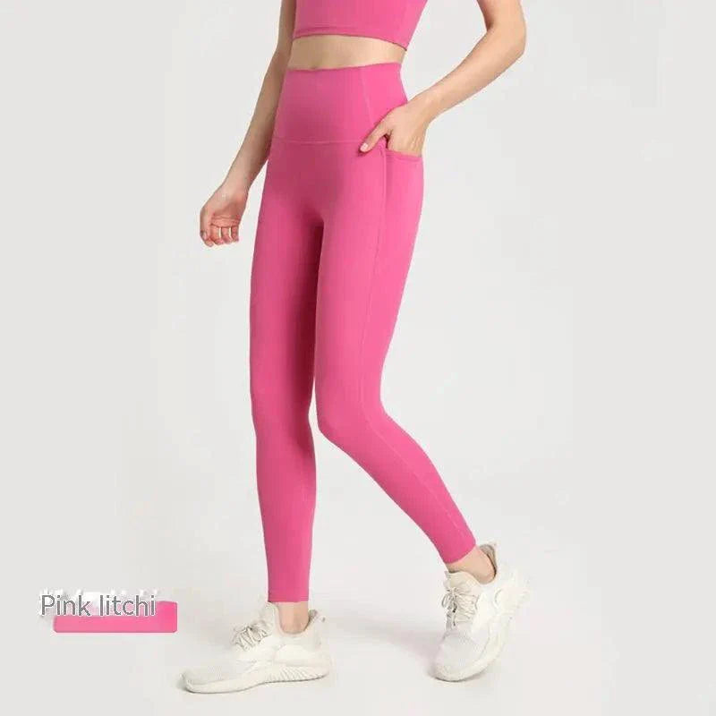 Comfortable women’s athletic pants by MANDOTOS featuring a dual-structure design and stretchy fabric for activewear.