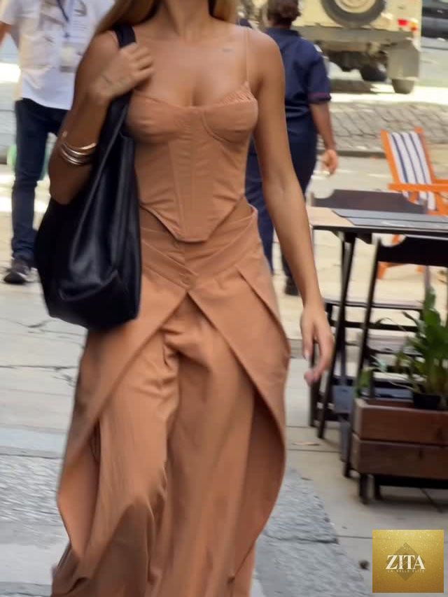 Zita La Belle Elite casualwear set featuring a camel spaghetti strap corset top and wide-leg pants, shown on a model.