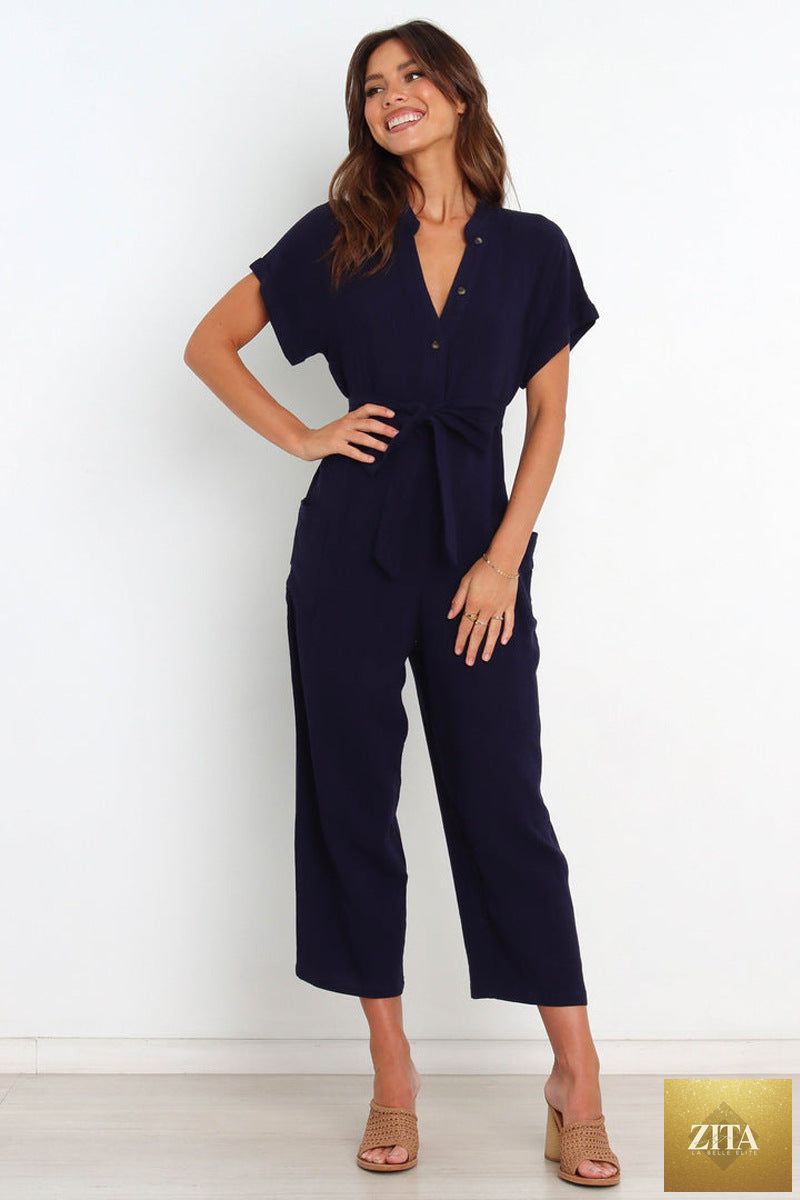 Women's V-neck cropped wide-leg knit jumpsuit by Zita La Belle Elite, shown hanging with a relaxed, casual fit and textured fabric.