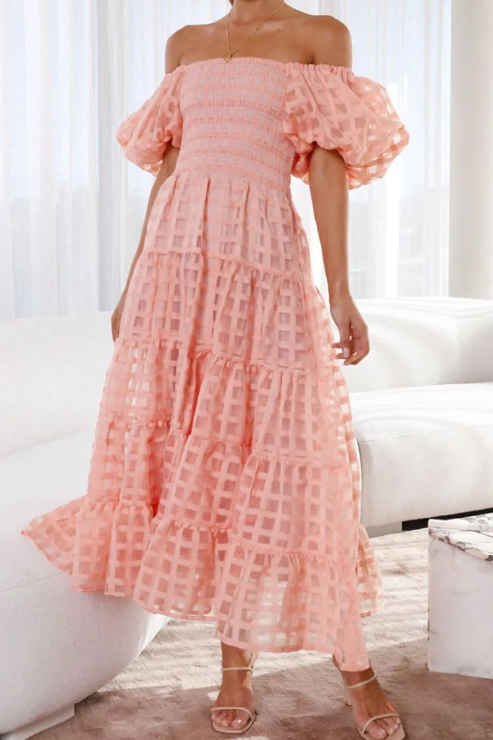 Off shoulder short puff sleeve midi dress by Shopiebay, featuring a feminine silhouette and stylish design in vibrant fabric.