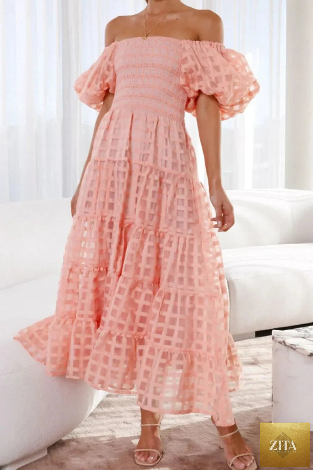 Off shoulder short puff sleeve midi dress by Shopiebay, featuring a feminine silhouette and stylish design in vibrant fabric.