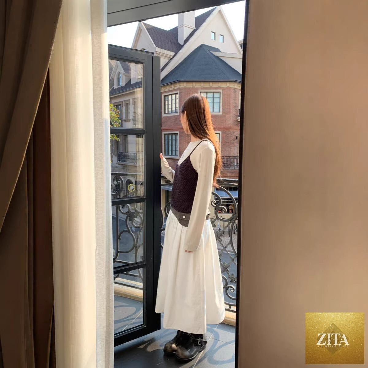 Zita La Belle Elite relaxed A-line crushed pleat cotton midi skirt with belt, casualwear, shown on a model.