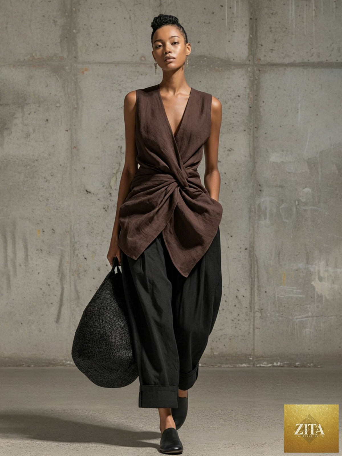 Women's casual FitiqueFit tie-front V-neck sleeveless top and wide-leg pants set, shown in a relaxed, stylish outfit.