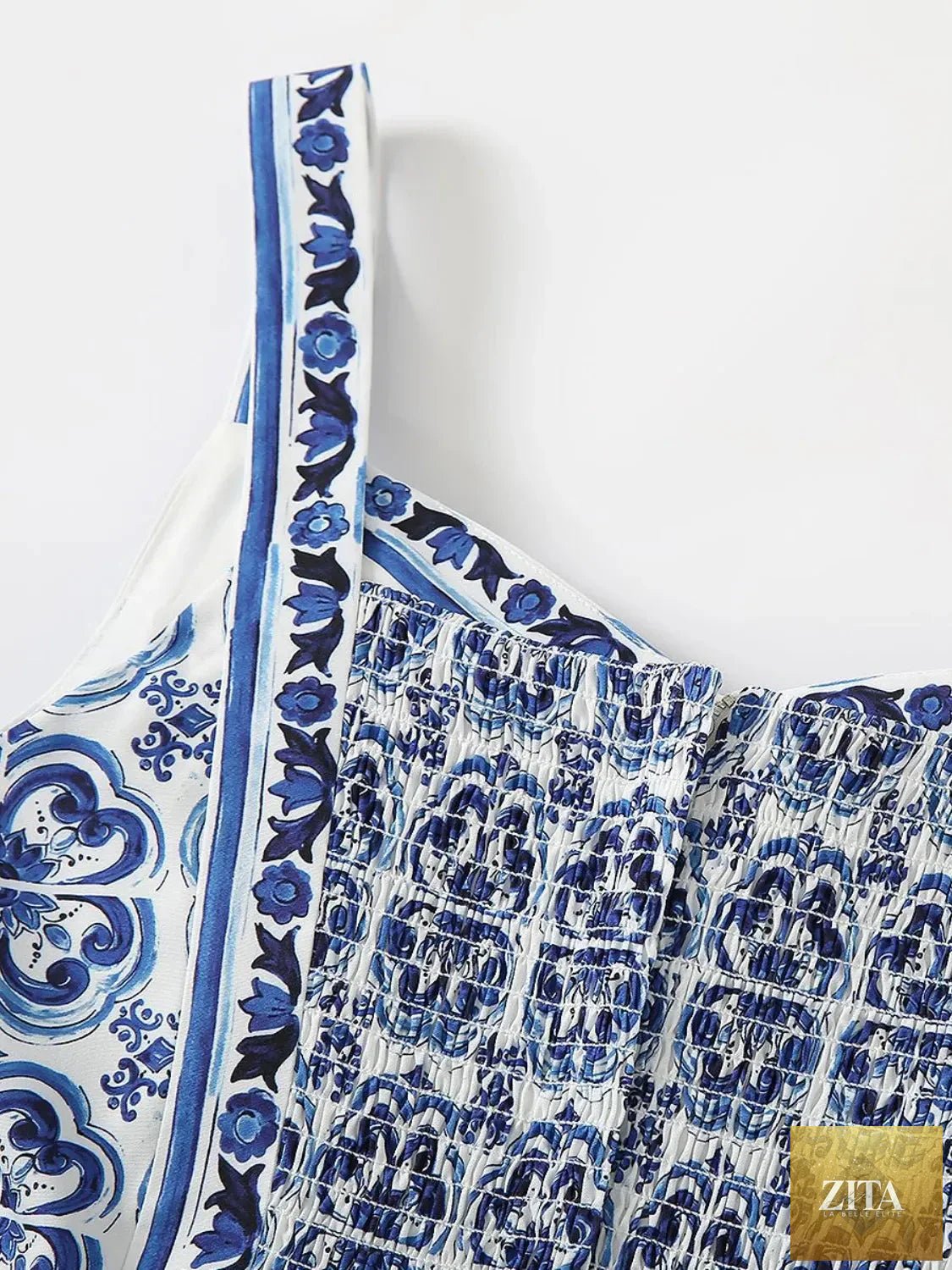 Smocked printed wide strap dress from Shopiebay, featuring a flowy design with colorful floral patterns and wide shoulder straps.