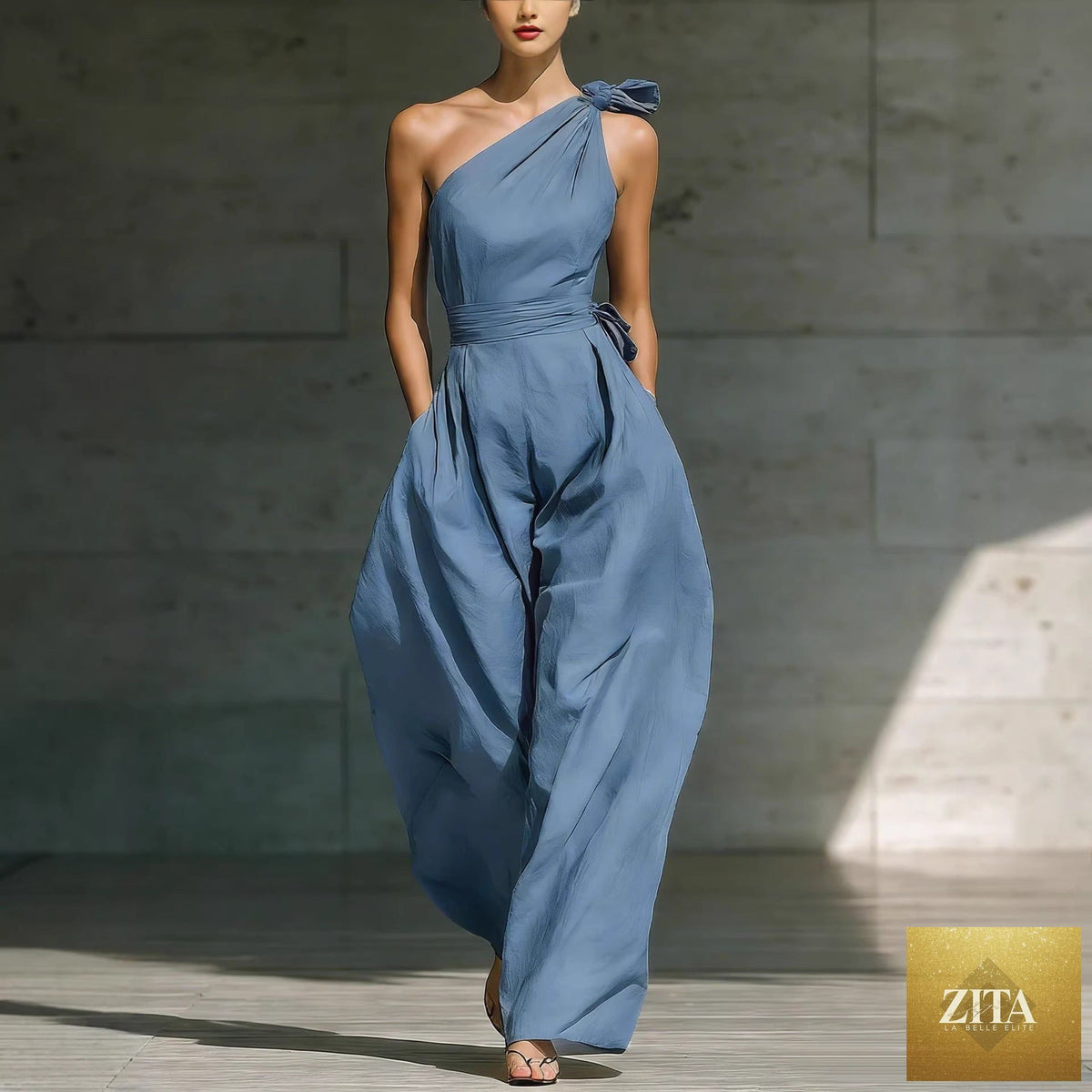 Women's loose, sleeveless off-shoulder wide-leg jumpsuit by Zita La Belle Elite, featuring a belted waist and casual style.