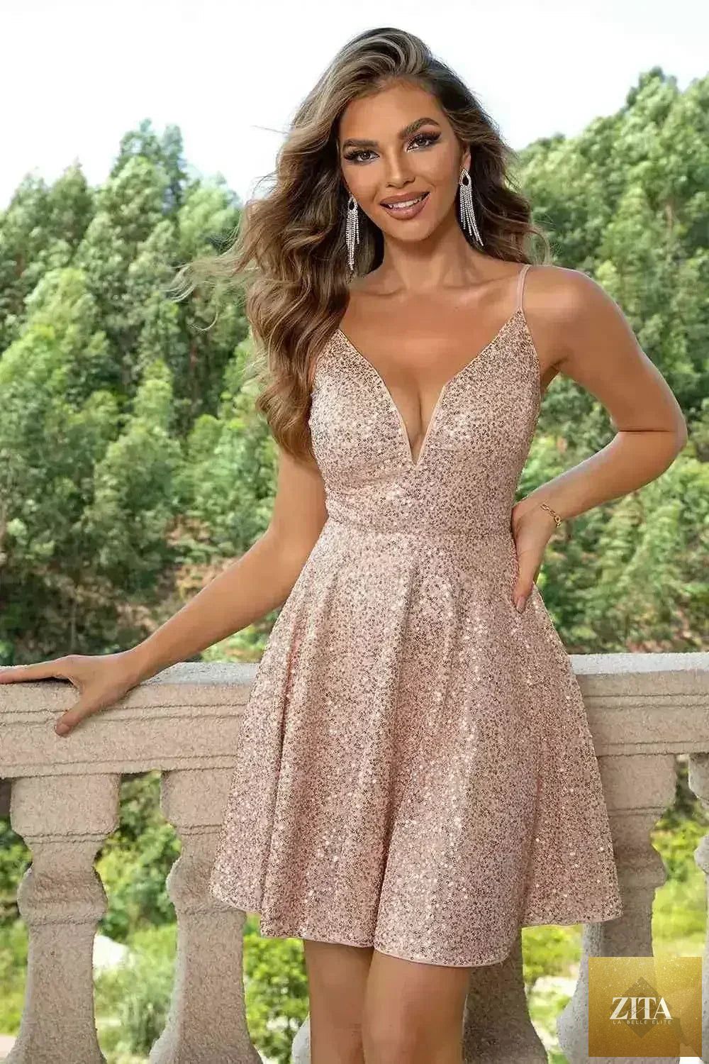 Femstylo sequin spaghetti strap mini dress with sparkling embellishments, perfect for party wear, shown on a model.