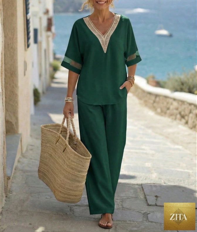 Women's embroidered V-neck top and wide-leg pants set by Zita La Belle Elite, featuring colorful embroidery in five shades.