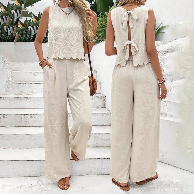 Elegant FitiqueFit 2-piece matching casualwear set with sleeveless crop top and wide-leg pants, perfect for stylish everyday wear.