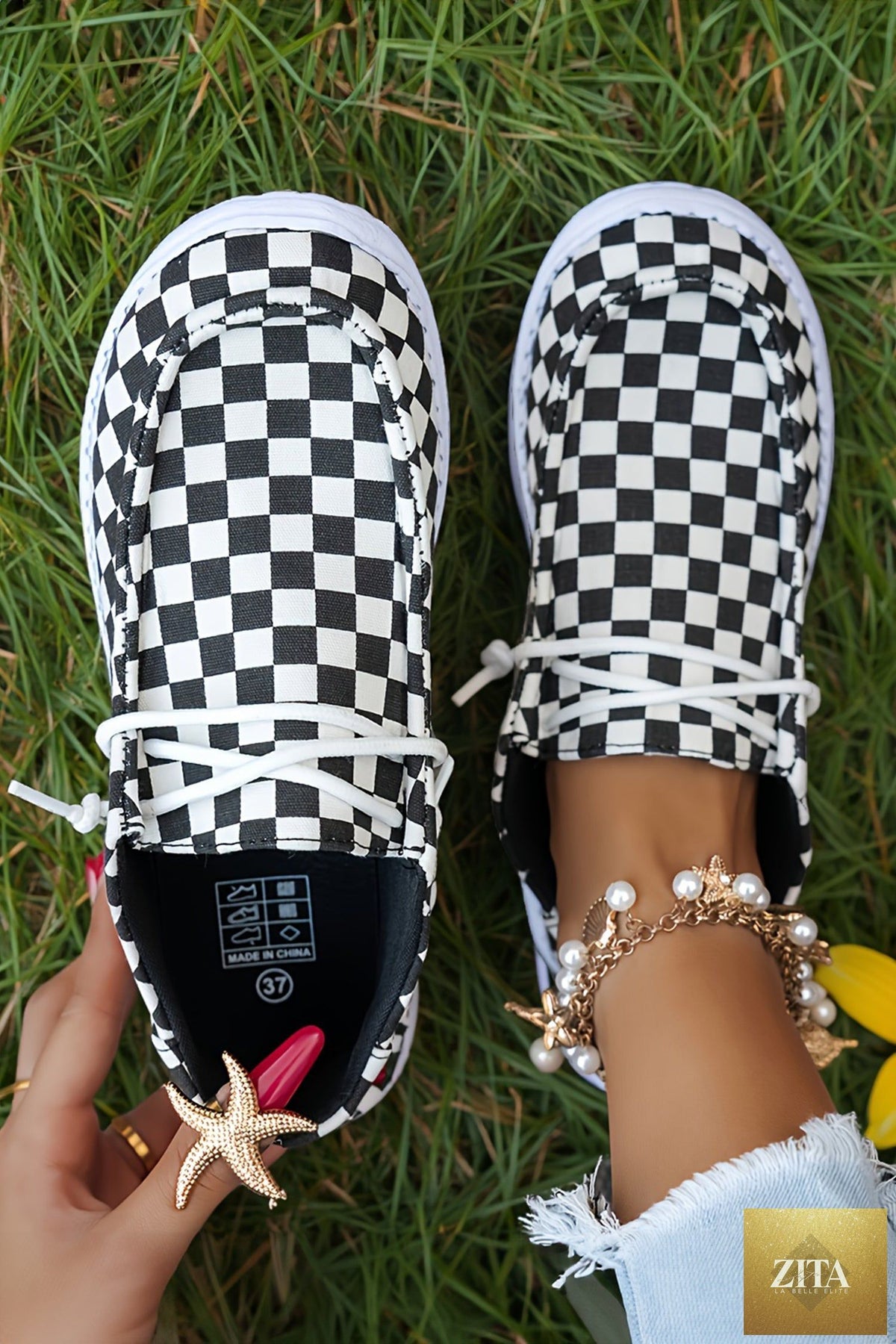 Black checkered print lace-up flat shoes for women with stylish detail, perfect for casual or trendy outfits.
