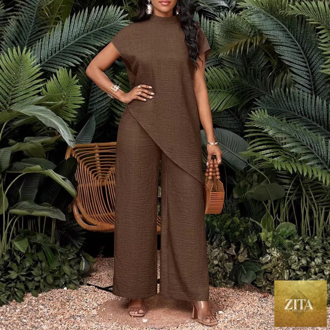 Asymmetrical sleeveless top and matching pants set for women by FitiqueFit, stylish two-piece outfit with modern design.