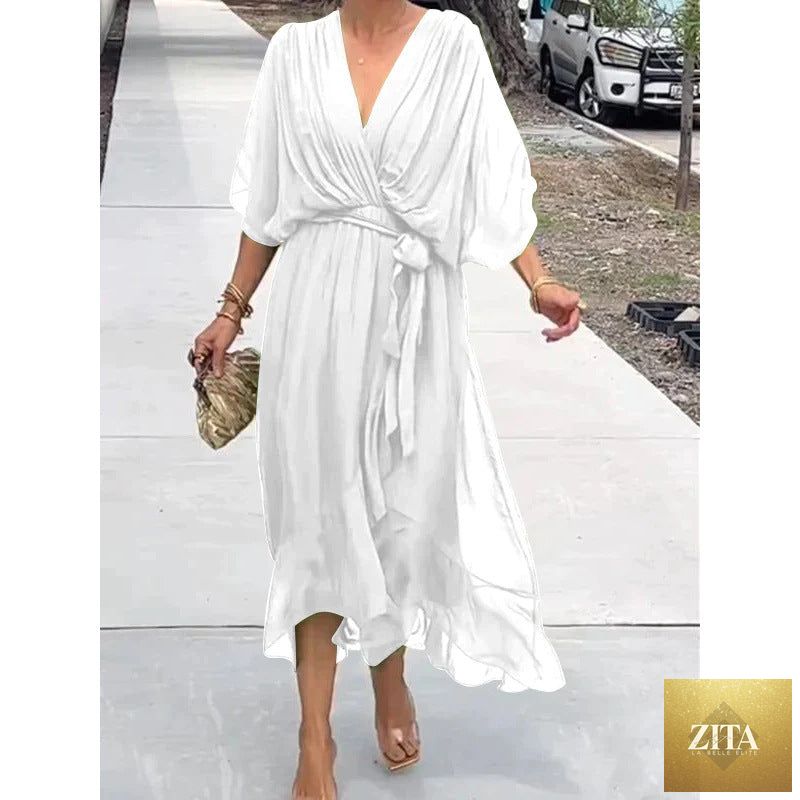 FitiqueFit Batwing Sleeve V-Neck Midi Dress with tied irregular hem, flowing fairy dress style for a chic, elegant look.