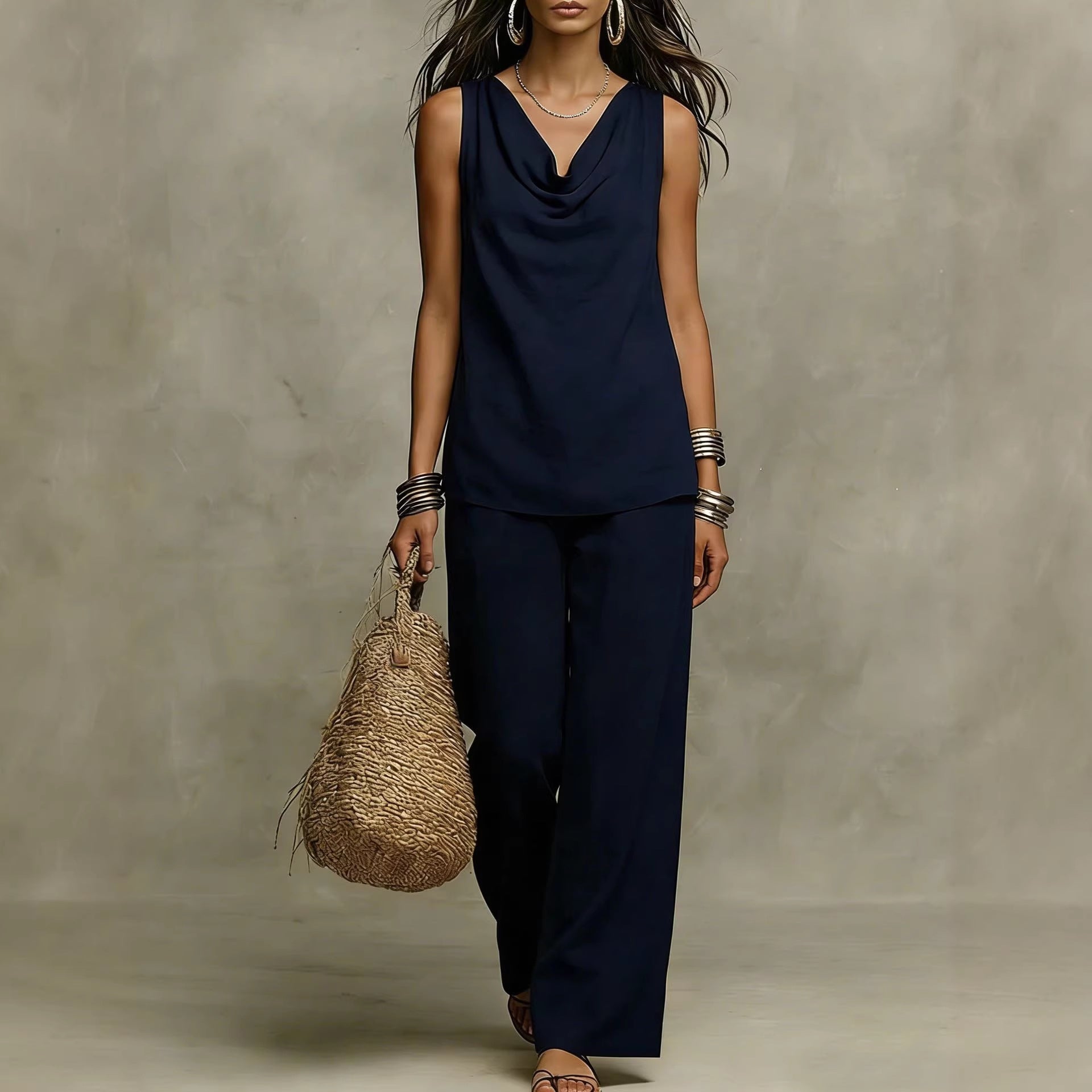 Women's sleeveless slash-neck tank top and casual pants set by FitiqueFit, featuring a relaxed fit and comfortable casual style.
