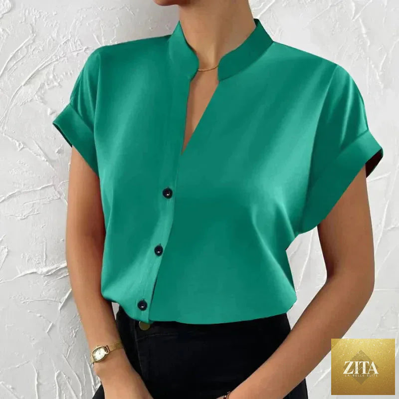 FitiqueFit women's satin V-neck short sleeve shirt, elegant casual summer wear with a smooth, shiny fabric and relaxed fit.