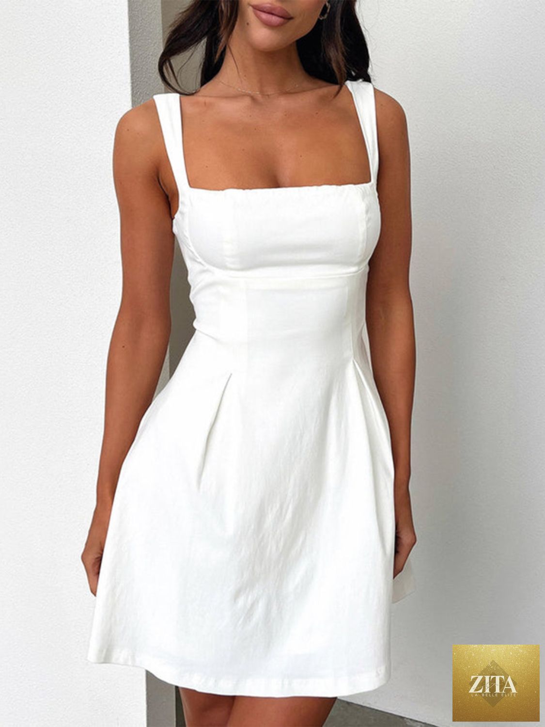 Dark blue Stevvex mini dress with bow back and square neckline, feminine and flattering for girls, perfect for stylish occasions.