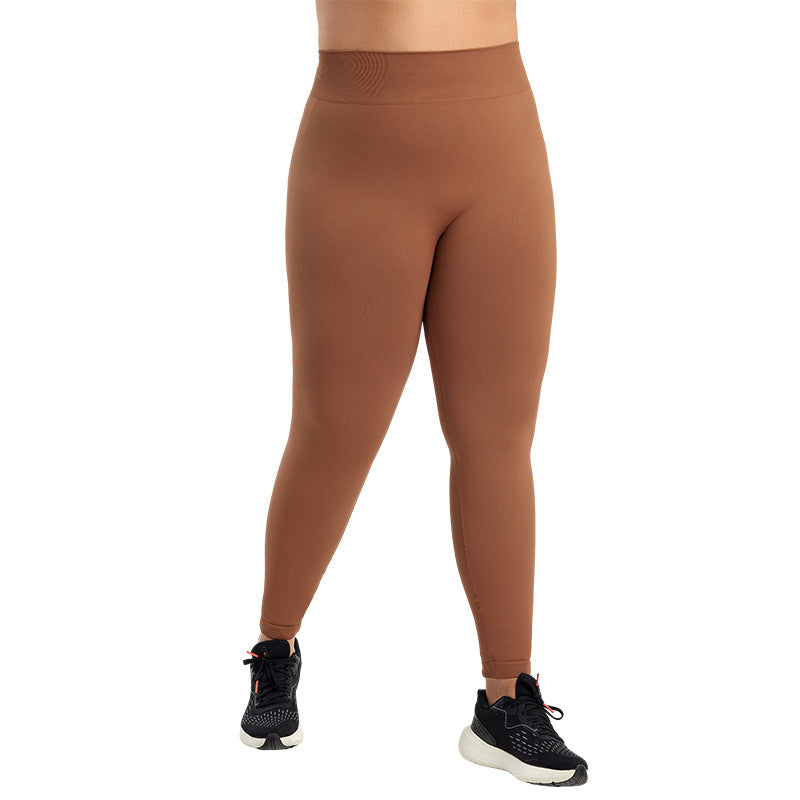 Plus-size women's yoga pants in extra-large size, comfortable stretch fabric, black color, suitable for active wear and yoga.