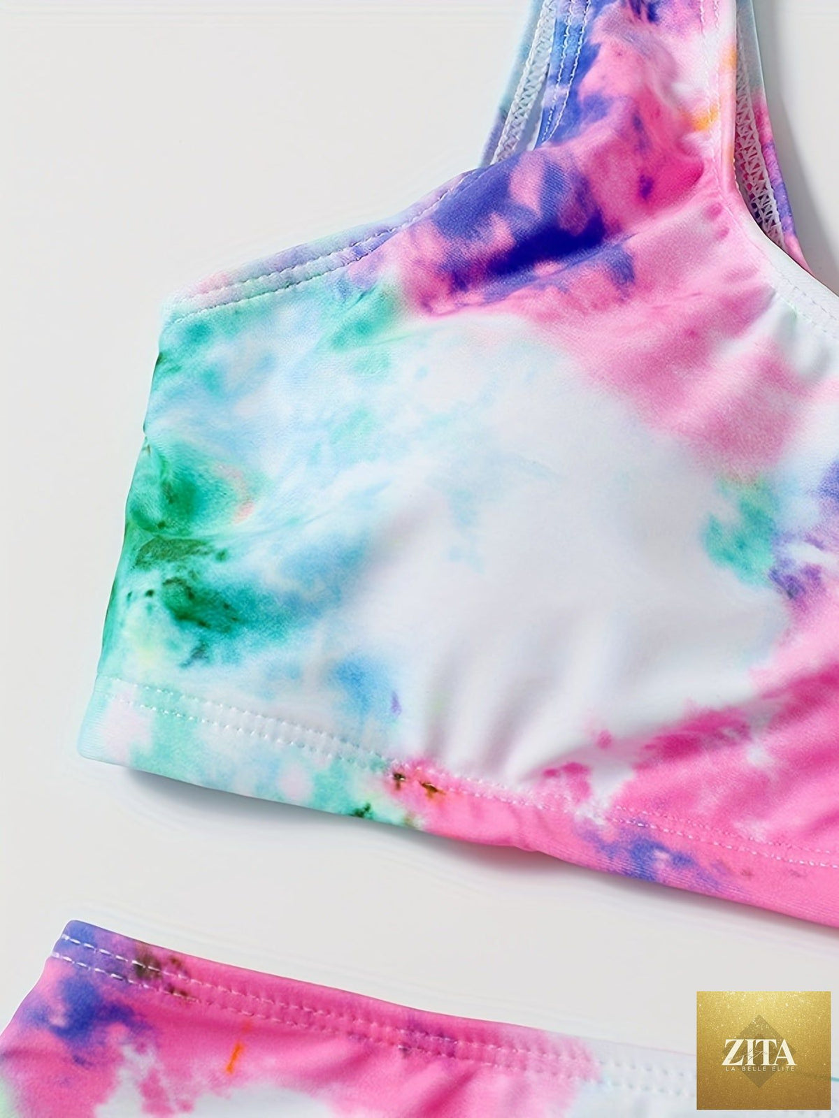 Stevvex tie dye bikini set featuring a high waist, round neck crop top, and high cut leg, perfect for summer beach and pool outings.