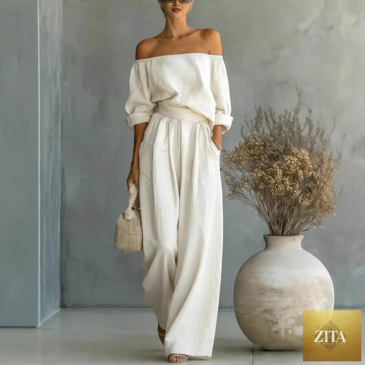 Women's casual off-shoulder long-sleeve top and wide-leg pants two-piece set by Zita La Belle Elite, featuring stylish, comfortable fabric.