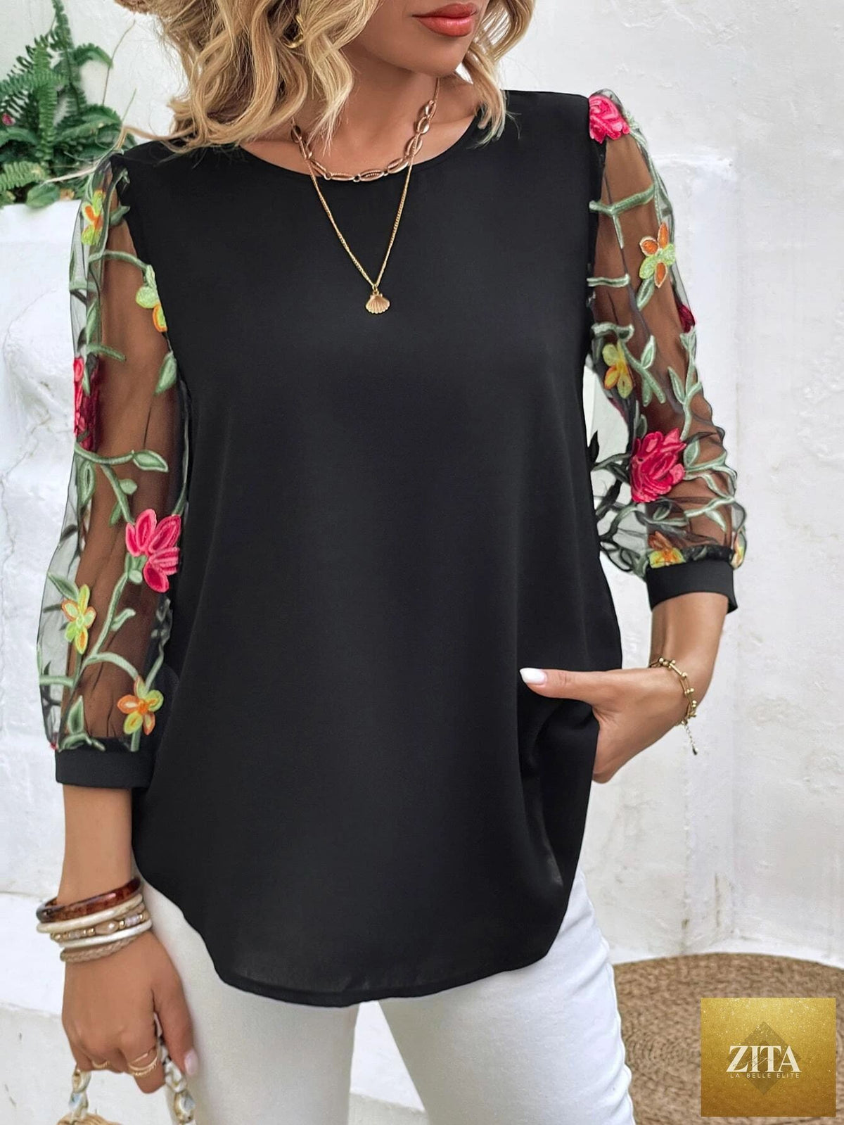 Women's mesh patchwork three-quarter sleeve casual top by Zita La Belle Elite, featuring a stylish and breathable design.