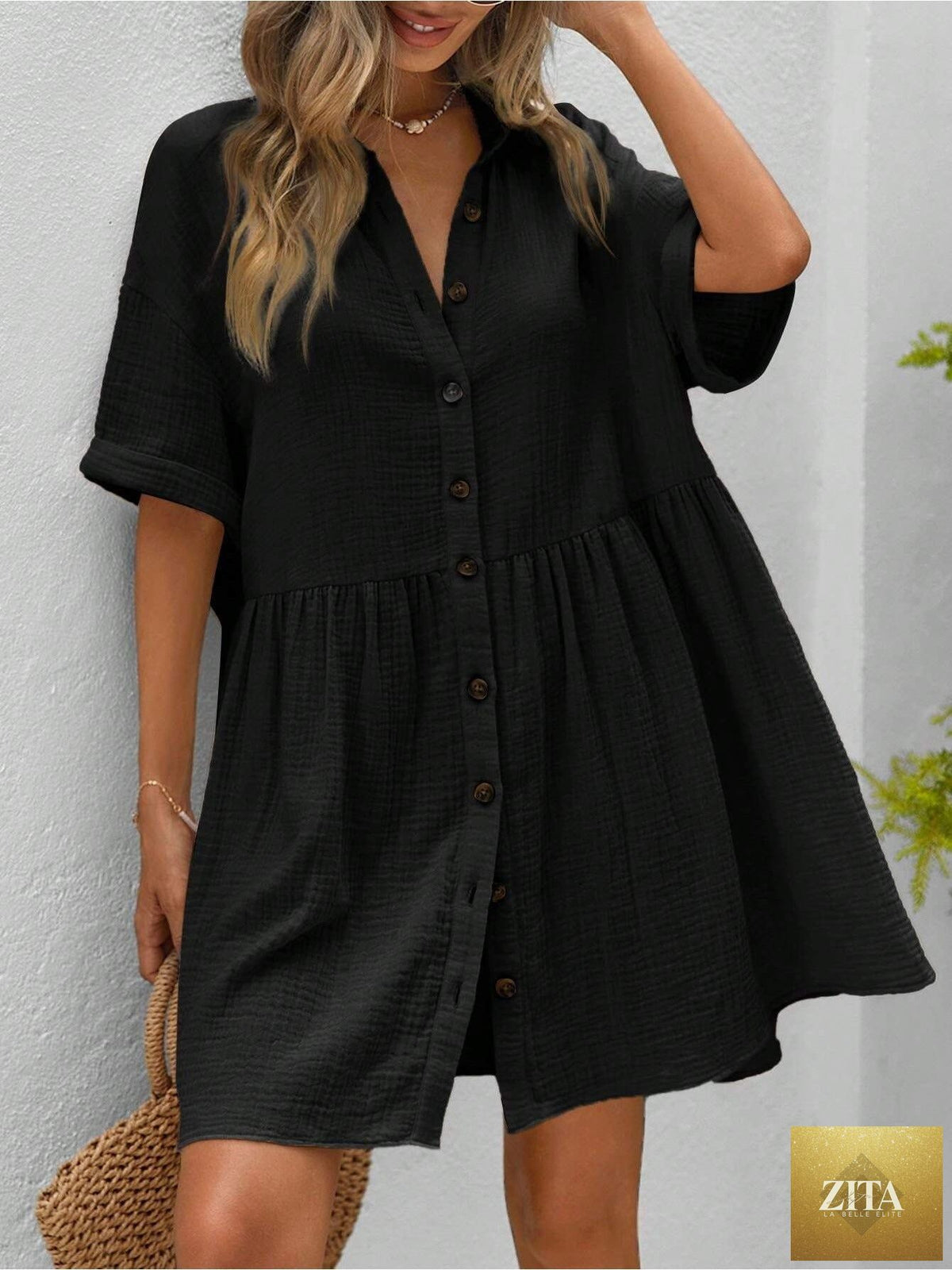 Women’s ruffle hem shirt dress by Zita La Belle Elite, loose fit summer casualwear, featuring a flowy style and ruffled hem detail.