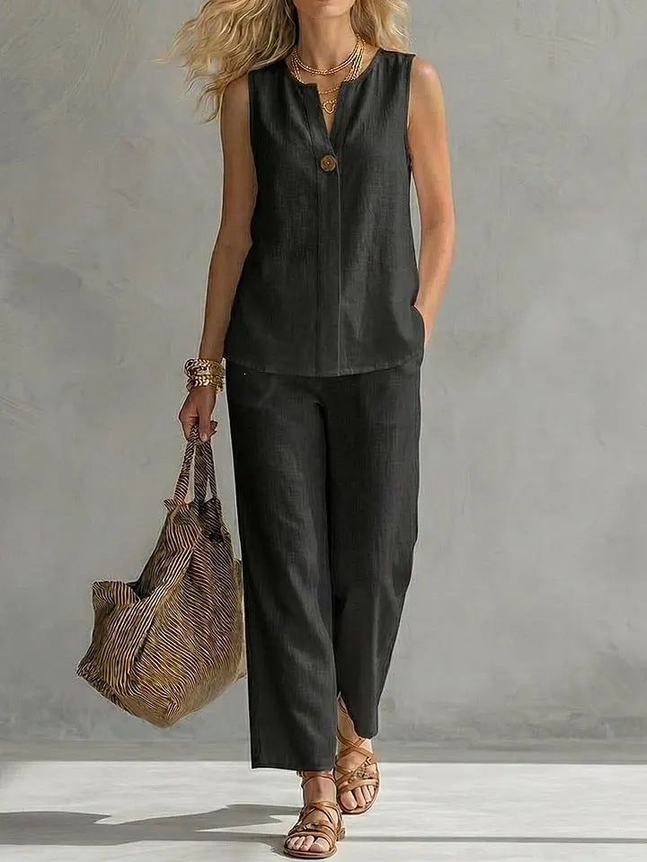 Women's sleeveless V-neck top and full-length pants casualwear two-piece set by FitiqueFit, featuring comfortable fabric and relaxed fit.