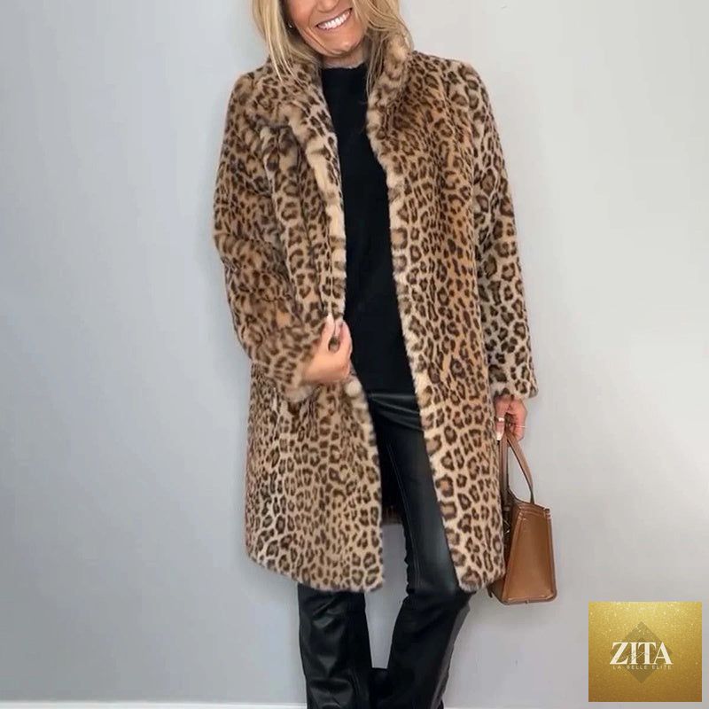 Leopard print plush jacket from FitiqueFit featuring a cozy, loose-fit, mid-length design with soft fabric and stylish animal print.
