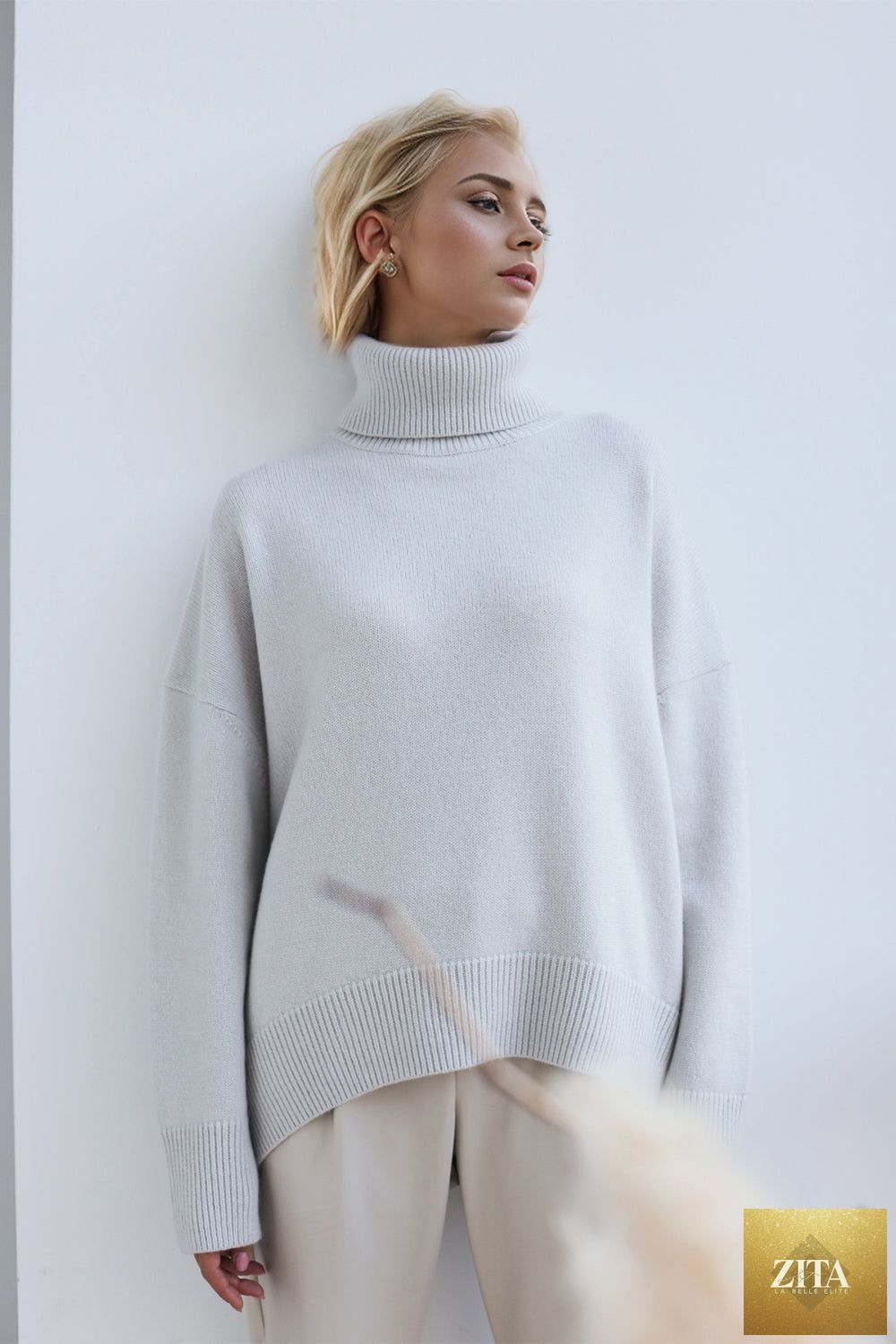 ShopBasicbae basic beige turtleneck sweater with dropped shoulders and long sleeves, casual and comfortable for everyday wear.