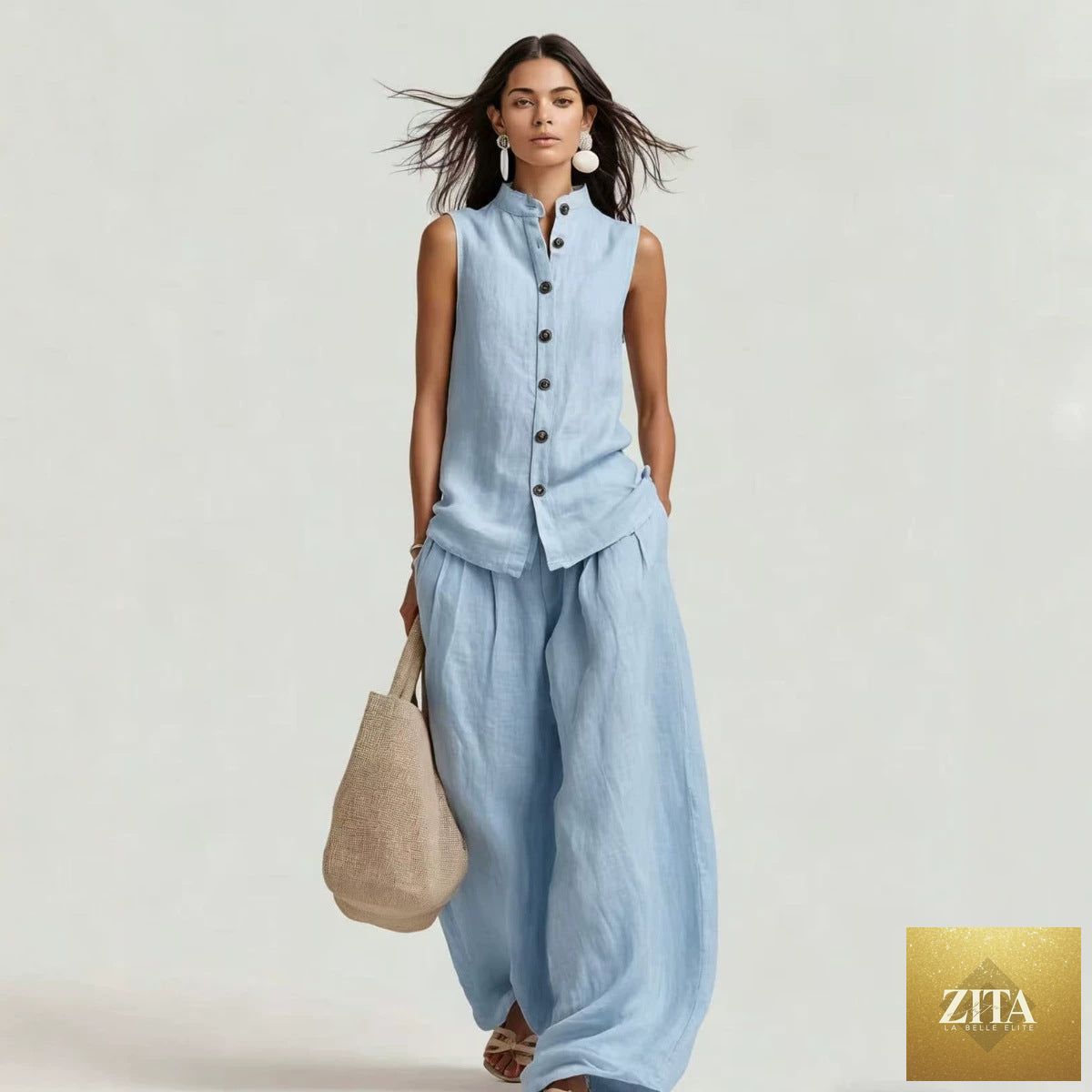 Women's sleeveless top and high-waist wide-leg pants set by Zita La Belle Elite, featuring a stand collar casualwear ensemble.