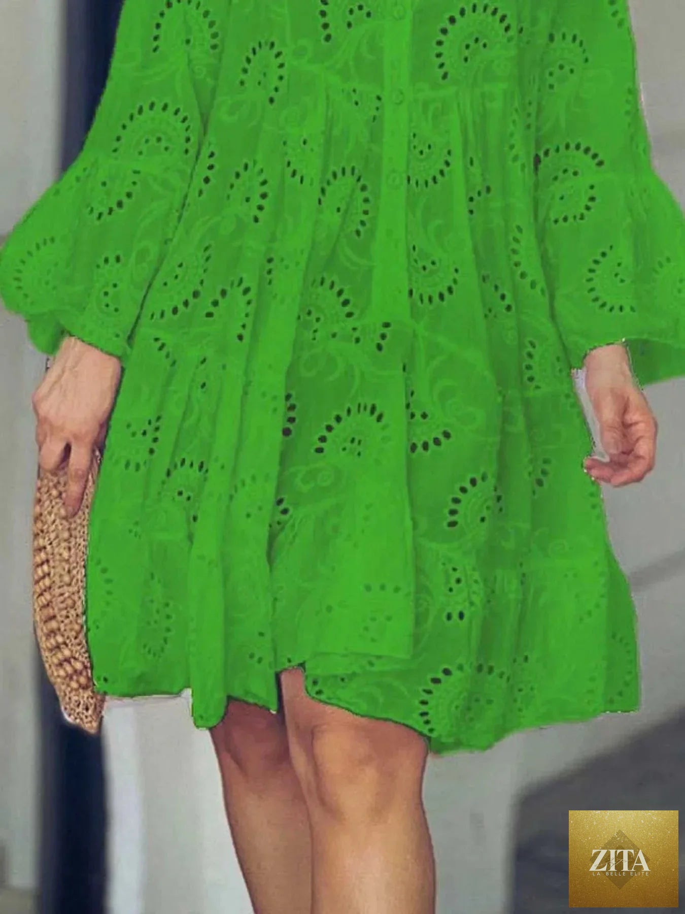 Eyelet ruffled hem tiered dress by Shopiebay featuring lightweight fabric, feminine ruffles, and a flowing, layered design.