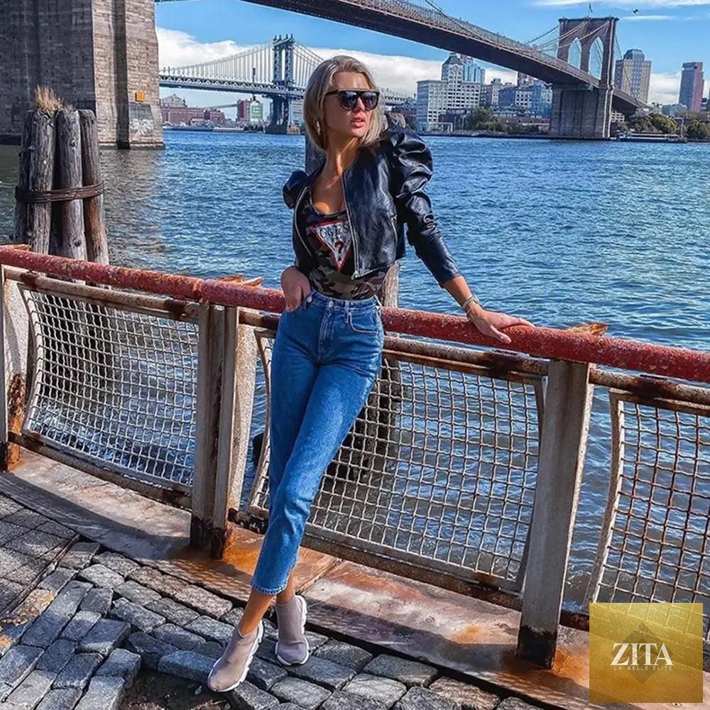 Stevvex women's solid color PU leather jacket for autumn and winter, long-sleeved, stylish and warm outerwear.