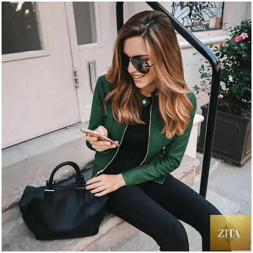 Stevvex women's solid color PU leather jacket, long-sleeved and warm, perfect for autumn and winter fashion.
