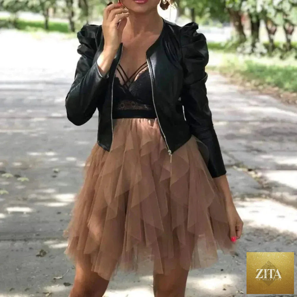 Stevvex women's solid color PU leather jacket featuring long sleeves, ideal for autumn and winter warmth and fashion.