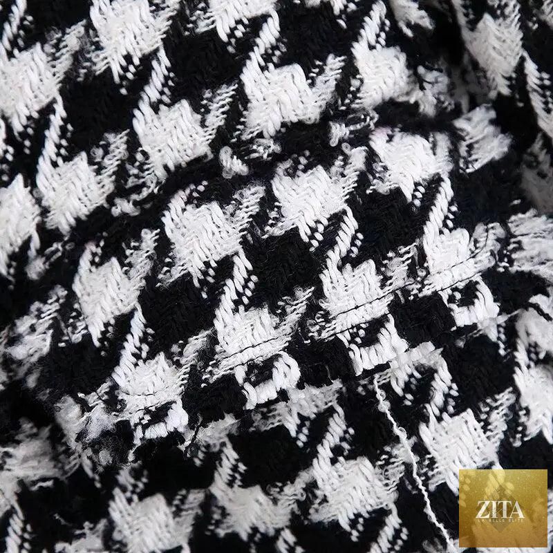Black tweed jacket for women with tassel details, houndstooth pattern, stylish for office and autumn wear, by Stevvex.
