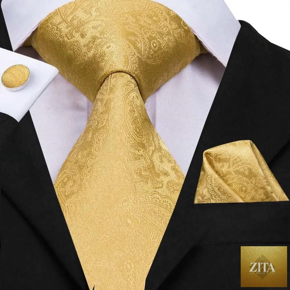 Elegant men's yellow gold tie set with matching handkerchiefs and cufflinks, perfect for weddings and formal suits by Stevvex.