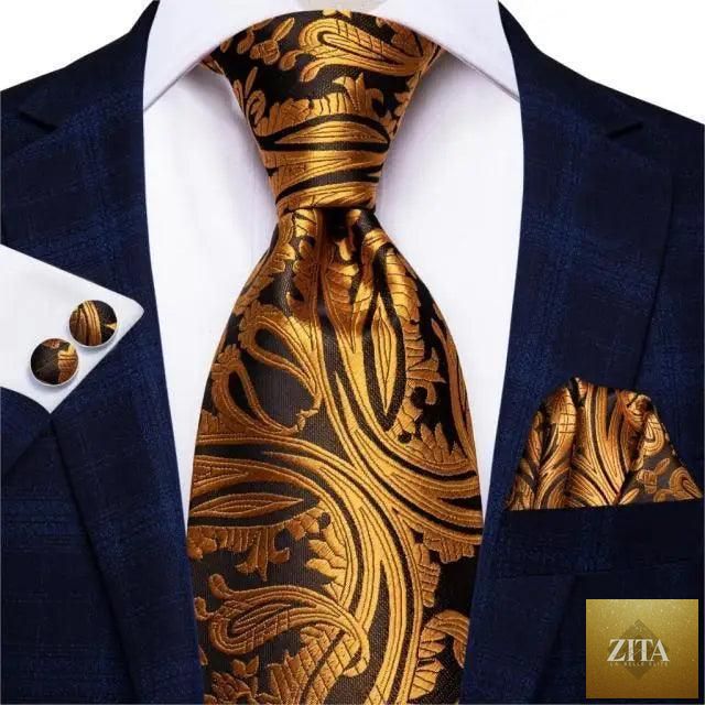 Elegant men's yellow gold tie set with matching handkerchief and cufflinks, perfect for weddings and formal suits by Stevvex.