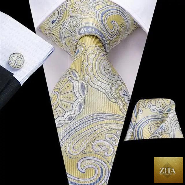 Elegant men's yellow gold tie set with matching handkerchief and cufflinks, perfect for weddings and formal suits.