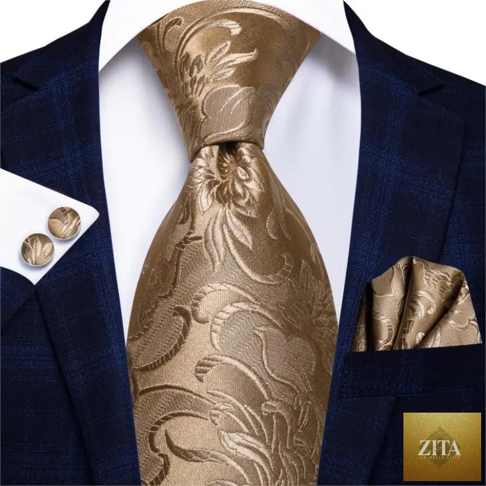 Elegant men's yellow gold tie set with matching handkerchiefs and cufflinks, perfect for weddings and formal suits by Stevvex.