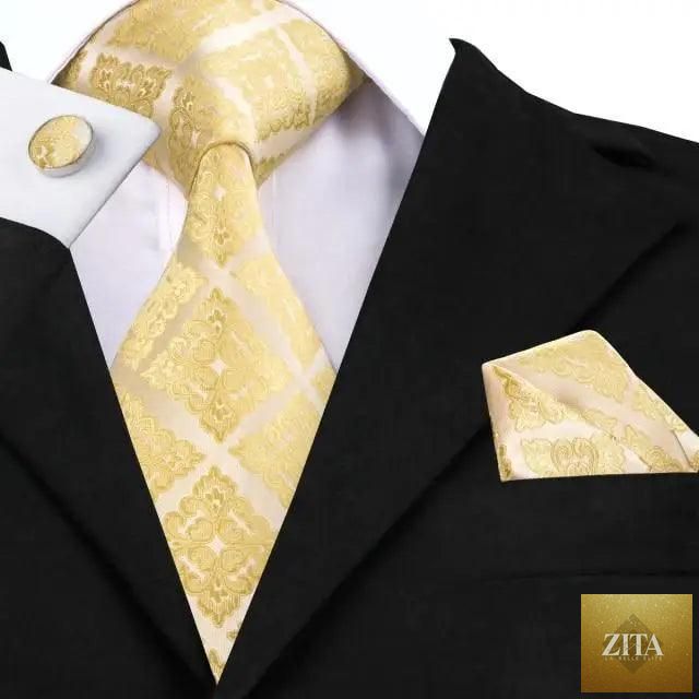 Elegant men's yellow gold tie set with matching handkerchiefs and cufflinks, perfect for business or wedding suits by Stevvex.