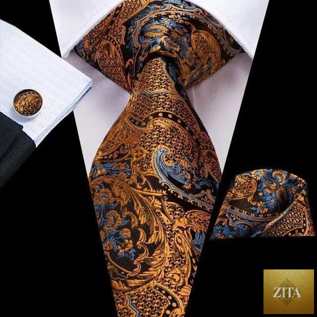 Elegant yellow gold tie set for men with matching handkerchief and cufflinks, perfect for weddings and formal suits.