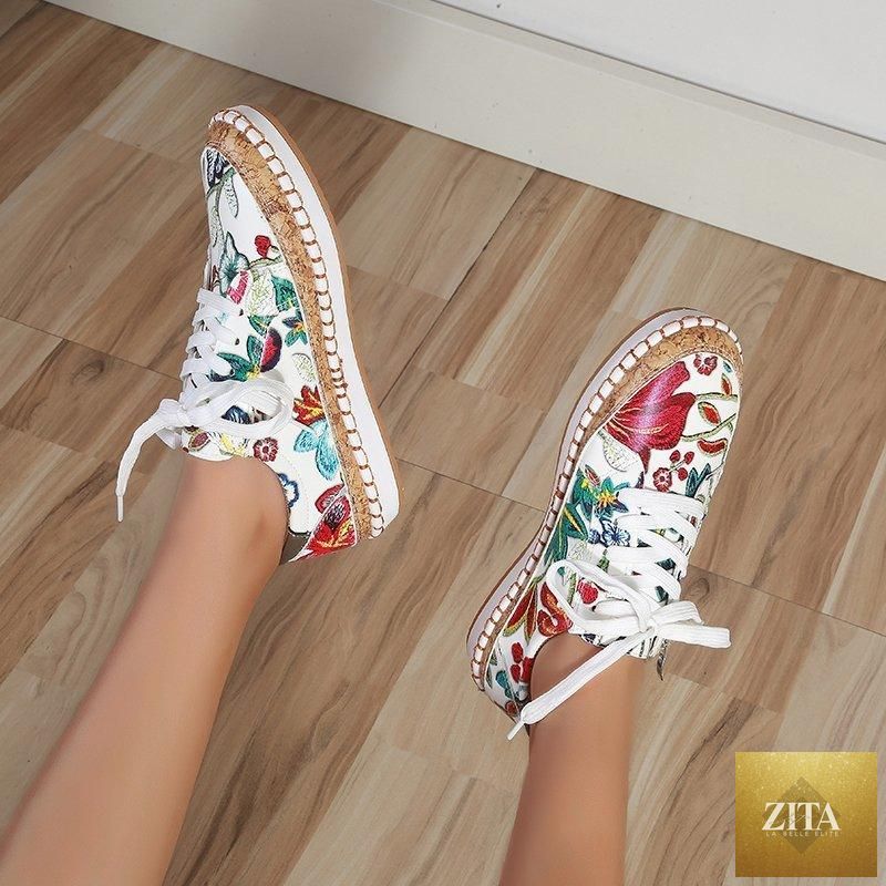 Elegant floral women's sneakers by Stevvex featuring printed lace-up design, round toe, casual flat shoes for walking and everyday wear.
