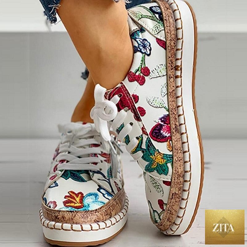 Elegant floral women's sneakers by Stevvex featuring printed lace-up design, round toe, flat casual style, ideal for walking and comfort.