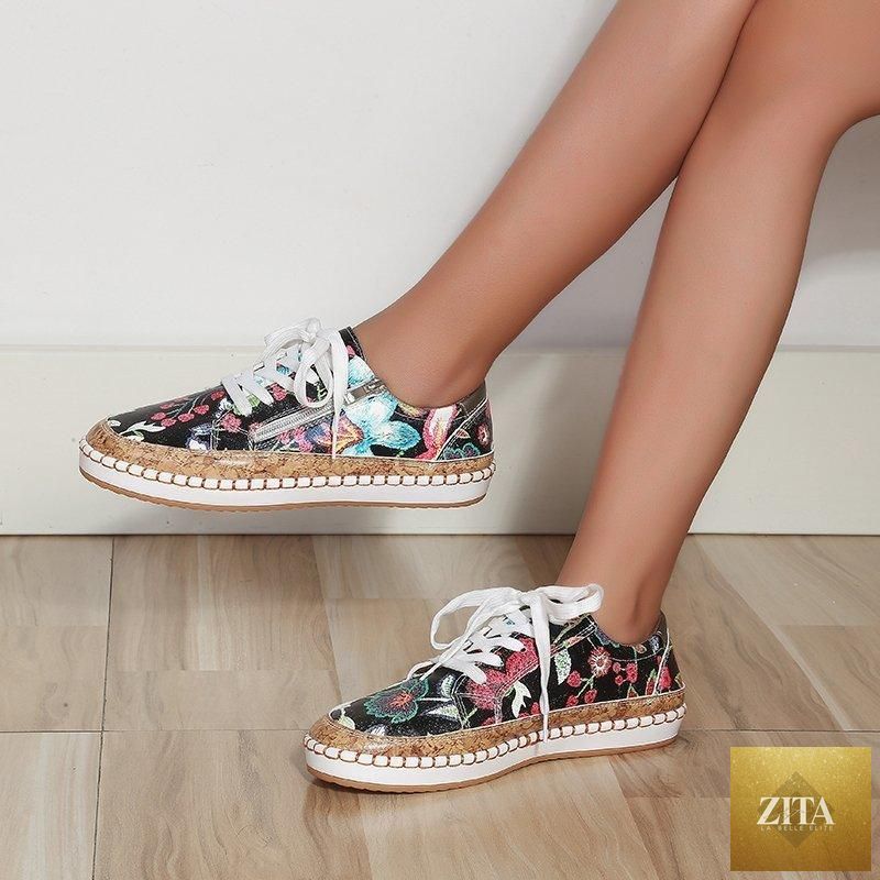 Elegant floral printed lace-up women's sneakers by Stevvex with round toe, flat design, ideal for casual walking and comfortable wear.